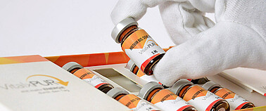 Lohnverpackung von Fläschchen bei Karl Knauer