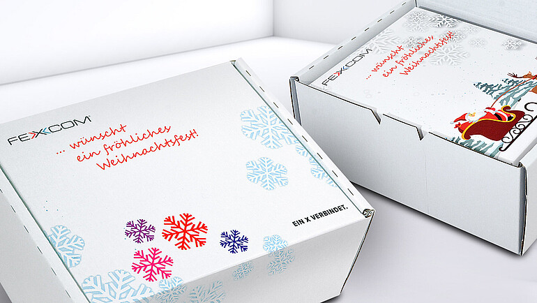 Umverpackung für FEXCOM aus weißem, bedruckten Karton